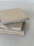 Boîte de carreaux de ciment uni